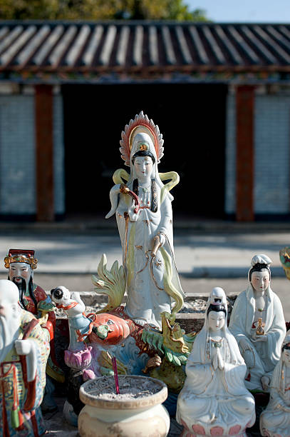 istock God Statues stand in front of a Chinese Temple 177036319