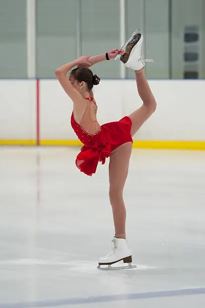 Figure skater holding a pose.
