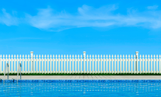 empty  swimming pool in the garden with white fence - rendering