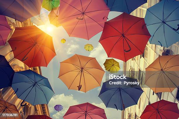 Umbrellas Falling From The Sky Stock Photo - Download Image Now - Umbrella, Multi Colored, Concepts