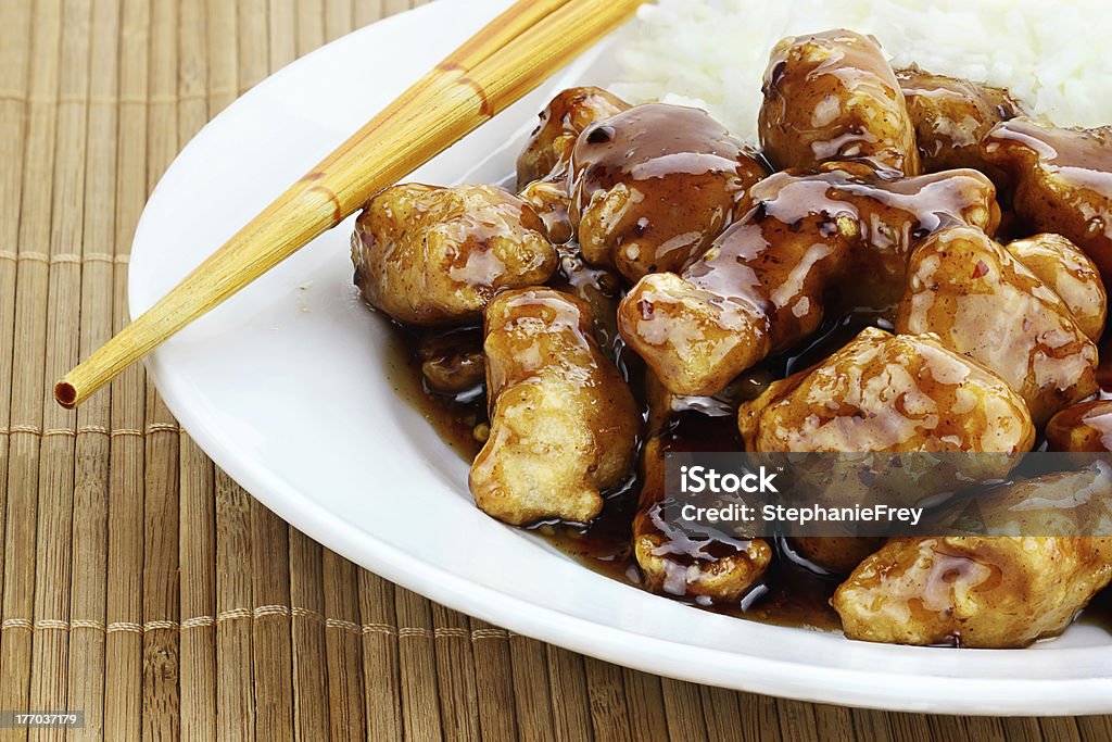 General Tso's Chicken General Tso's Chicken served with white rice. Chicken Meat Stock Photo