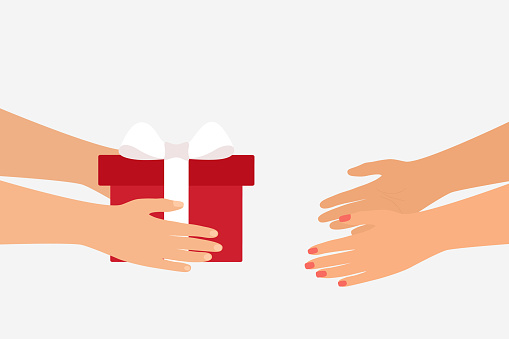 Side View Of Hands Giving Gift Box To Another Hand. Happy New Year And Christmas Celebration Concept