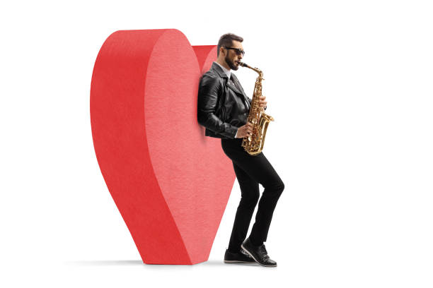 istock Romantic male musician in a leather jacket playing a saxophone 1770374382