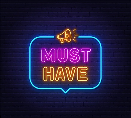Must Have neon sign in the speech bubble on brick wall background