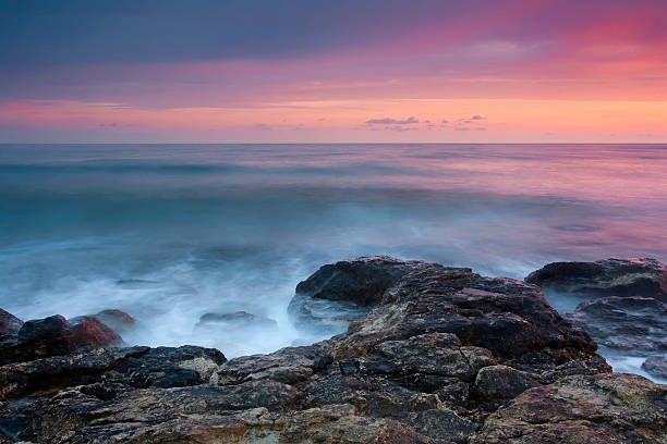 istock Beautiful rocky sea beach at the sunset 177039502