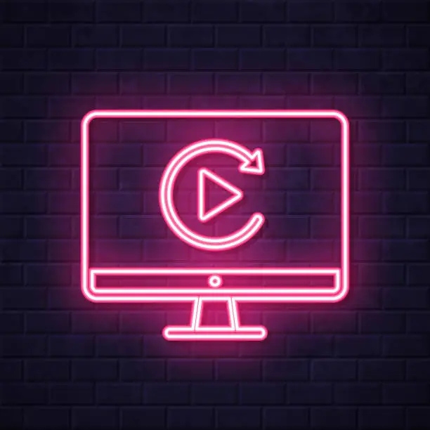 Vector illustration of Replay on desktop computer. Glowing neon icon on brick wall background