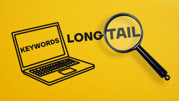 long tail keywords are shown using the text and picture of laptop - tail long marketing internet imagens e fotografias de stock