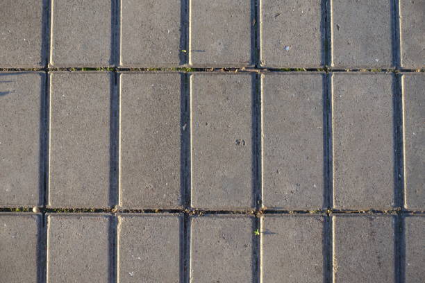 istock Surface of stack bond brick like gray concrete pavement 1770398891