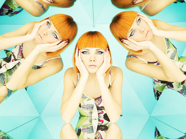 Bright redhead woman in kaleidoscope stock photo