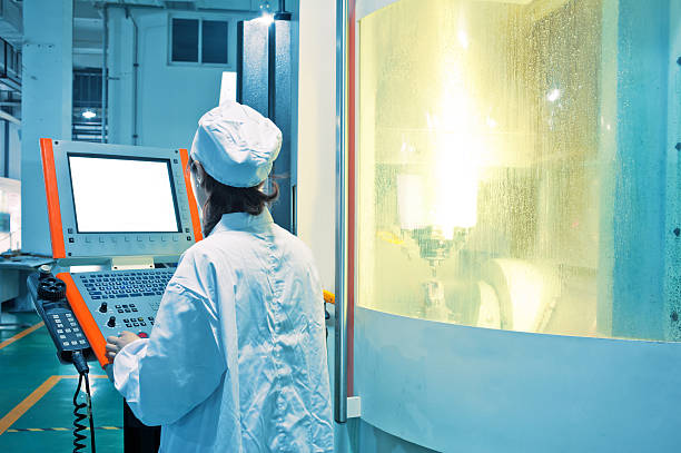istock Workers in the operation of CNC machine tools 177041678
