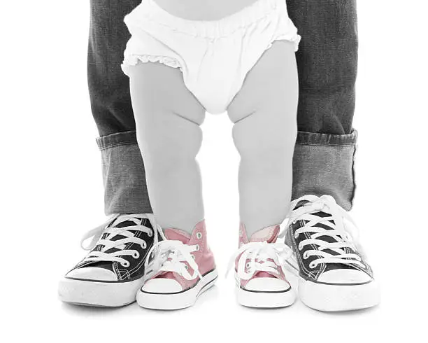 "Mom and baby, black and white shoes with girly pink accent!"
