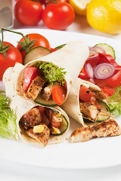 istock Grilled chicken and salad in tortilla wrap 177042216