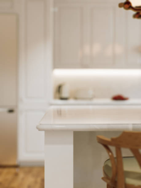 istock Kitchen white countertop with white marble, with blurred bokeh background. Presentation of goods in the kitchen interior on the countertop surface. 3D rendering 1770427679