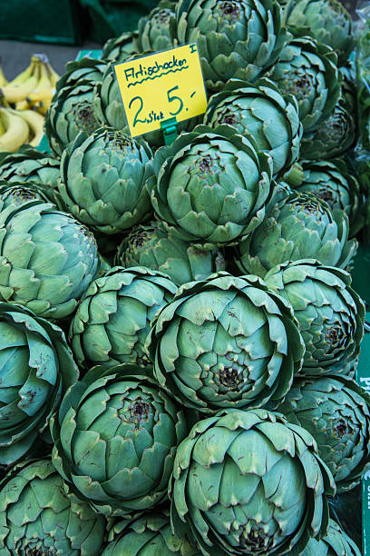 artichokes at farmer's market stock photo