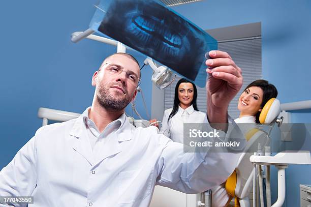At Dental Clinic Stock Photo - Download Image Now - Adult, Analyzing, Assistance