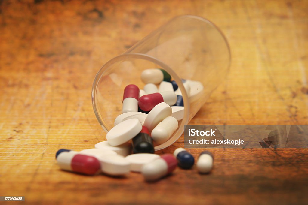 Pills on grunge background Close up of Pills on grunge background Abstract Stock Photo