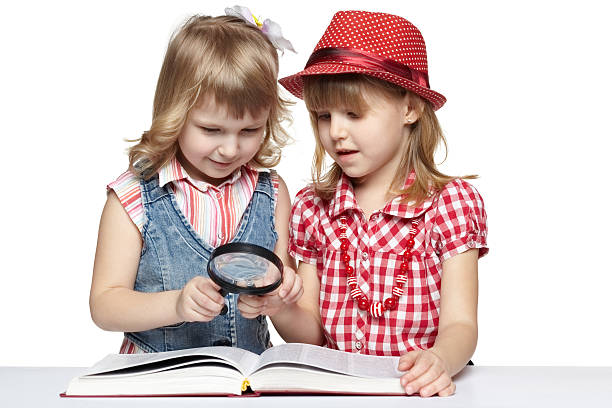istock Two girls reading the book 177043653