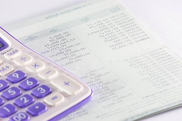 istock bank passbook with  part of calculator 177044346