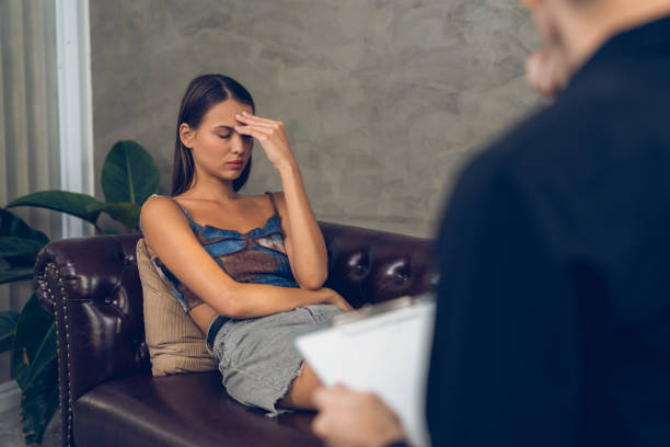 istock Stressed and depressed patient seeking help from psychiatrist. Unveiling 1770446404