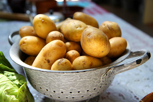 Bowl of potatoes stock photo