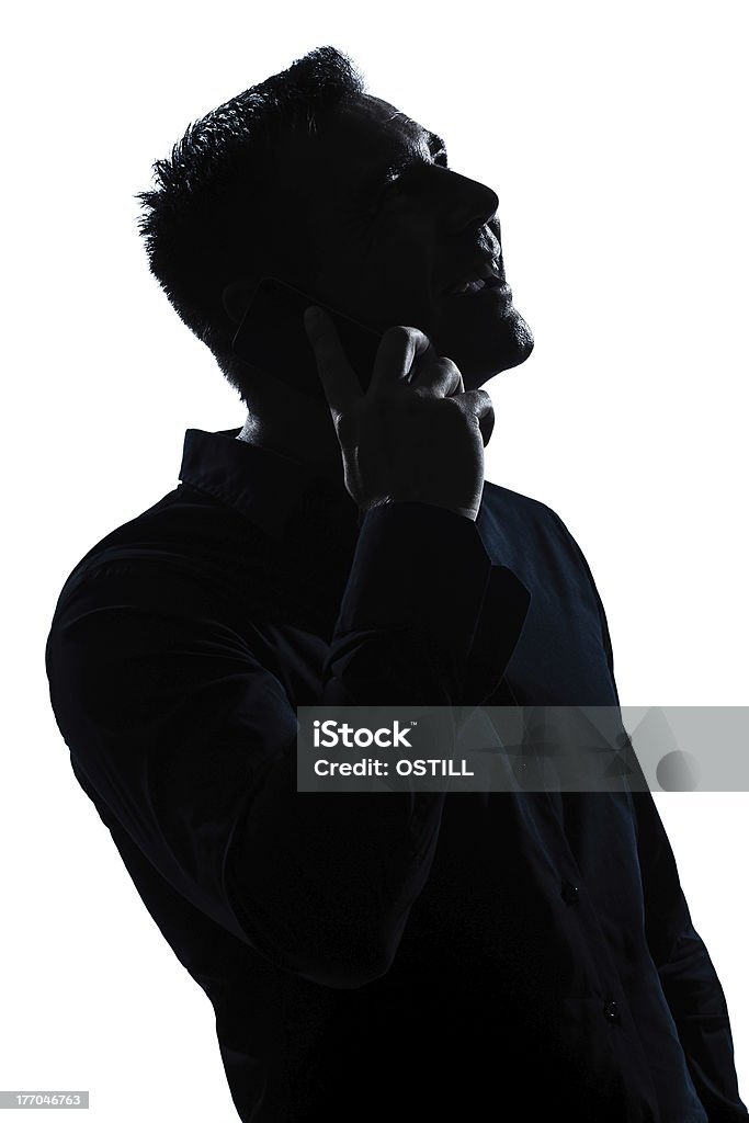 Silueta hombre Retrato de feliz teléfono - Foto de stock de Silueta libre de derechos