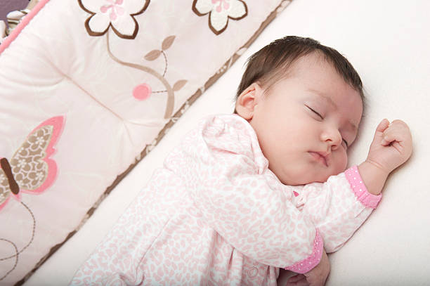 Baby girl sleeping stock photo