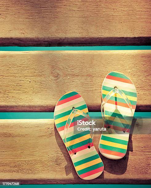 Beach Flip Flops On Wood Stock Photo - Download Image Now - Bright, Concepts, Concepts & Topics