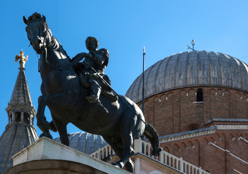 Veneto, Padua, the Gattamelata monument and the domes of St.Antony Basilica