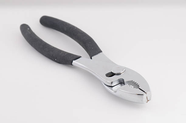 Pair of basic steel pliers stock photo