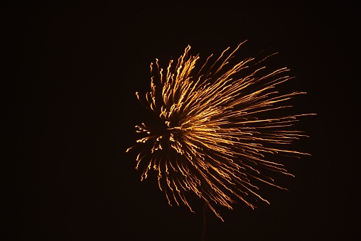 The firecrackers in action in the night sky during Deepavali or Diwali, Indian festival of lights