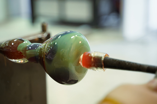 Close-up of glass blowing and glassmaking process