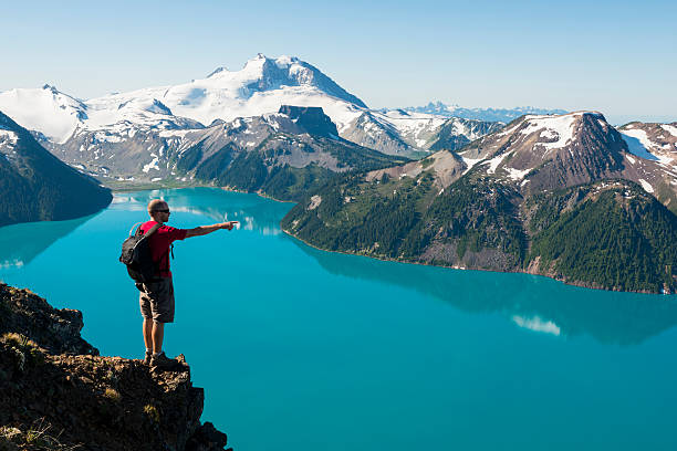 Mountain Solitude Hiker in British Columbia's Coast Mountains garibaldi park stock pictures, royalty-free photos & images