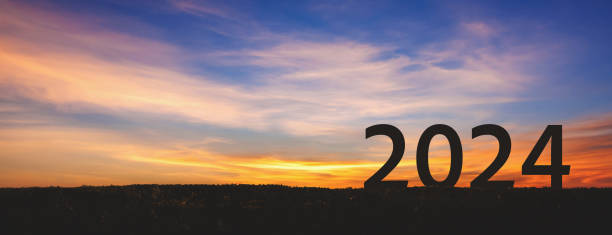 istock New year 2024 with sunset sky background 1770512217