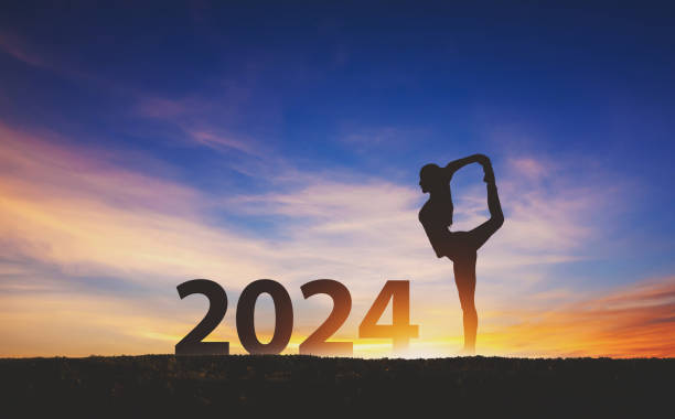 New year 2024 fitness healthy woman yoga with sunset sky background New year 2024 healthy concept, Silhouette fitness woman yoga with sunset sky background 2024 30 stock pictures, royalty-free photos & images