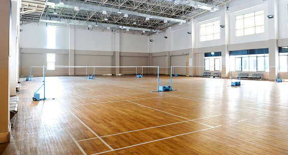 Interior of empty indoor badminton court