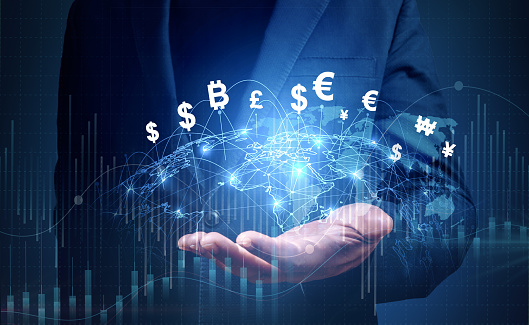 Financial Technology, Global business and Global currency exchange concept, money, finance, Businessman holding virtual world map and connection line effect, dollar yuan yen euro