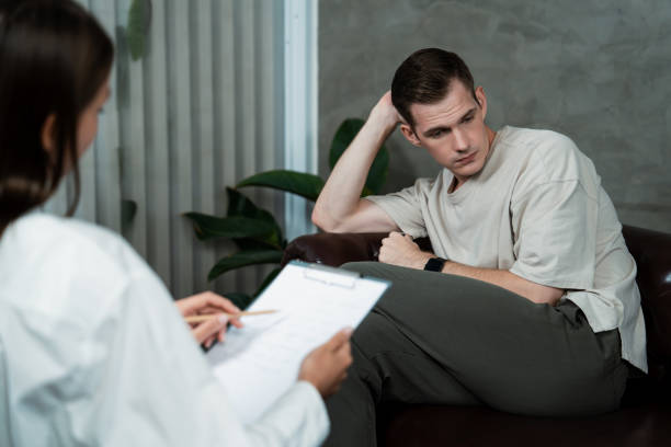 istock Stressed and depressed patient seeking help from psychiatrist. Unveiling 1770531290
