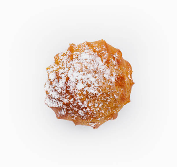 istock profiterole in sugar powder isolated on white 1770559649