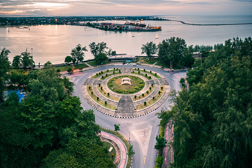 Song Thale Park near Naga head, songkhla deep sea port and Krom Luang Chumphon Monument, Songkhla, Thailand. Text on  traffic circle is Song Thale Park.