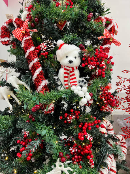 istock Christmas tree decorated with teddy bear, garlands and toys 1770574320