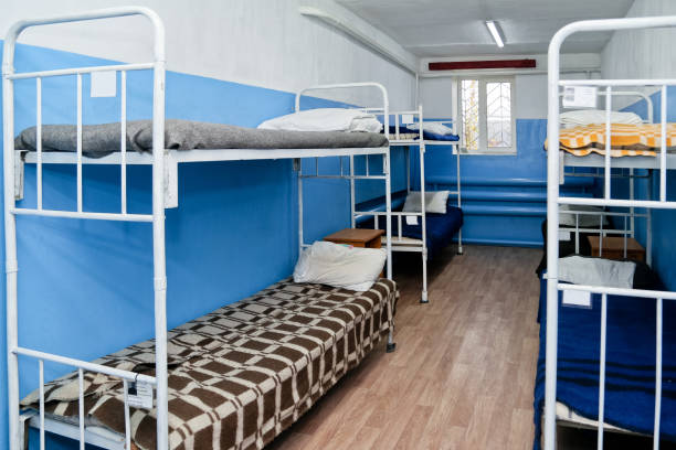 istock Interior of a prison cell with bunk beds and bunk beds 1770596613