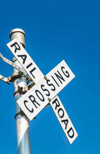 istock Railroad warning crossing sign under blue sky 177060507
