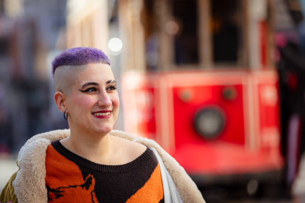 istock Portrait of purple haired non-binary person. 1770611742