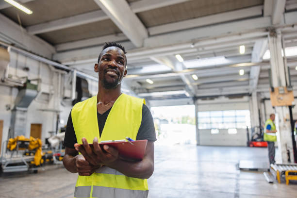 istock African American Airport Warehouse Worker With A Notepad 1770615612