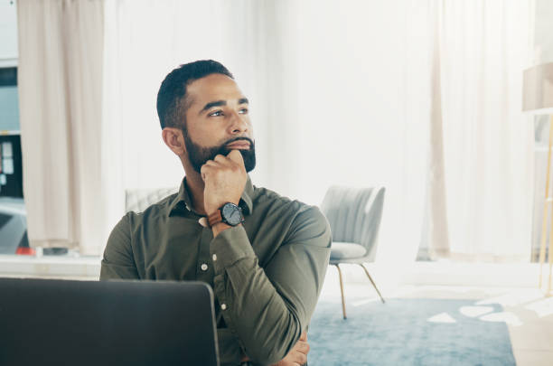 istock Business, thinking and man with a laptop, problem solving and decision with a startup, creativity and planning. Person, employee and entrepreneur with a pc, solution and choice with a project or idea 1770662860