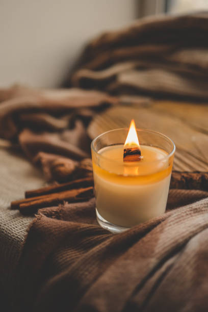 istock Burning candle in home interior, autumn aesthetics 1770664638