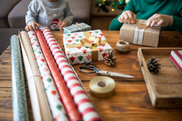 istock Decorating the Christmas presents and having fun together 1770665833