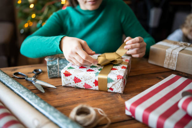 istock Whrapping up the Christmas presents. 1770666399