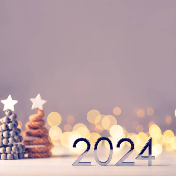 istock Metal numbers 2024 on table with bokeh lights. 1770674476