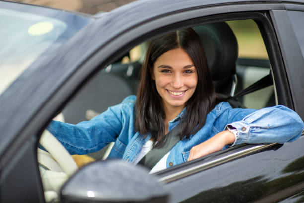 istock happy woman smiling in car 1770685430